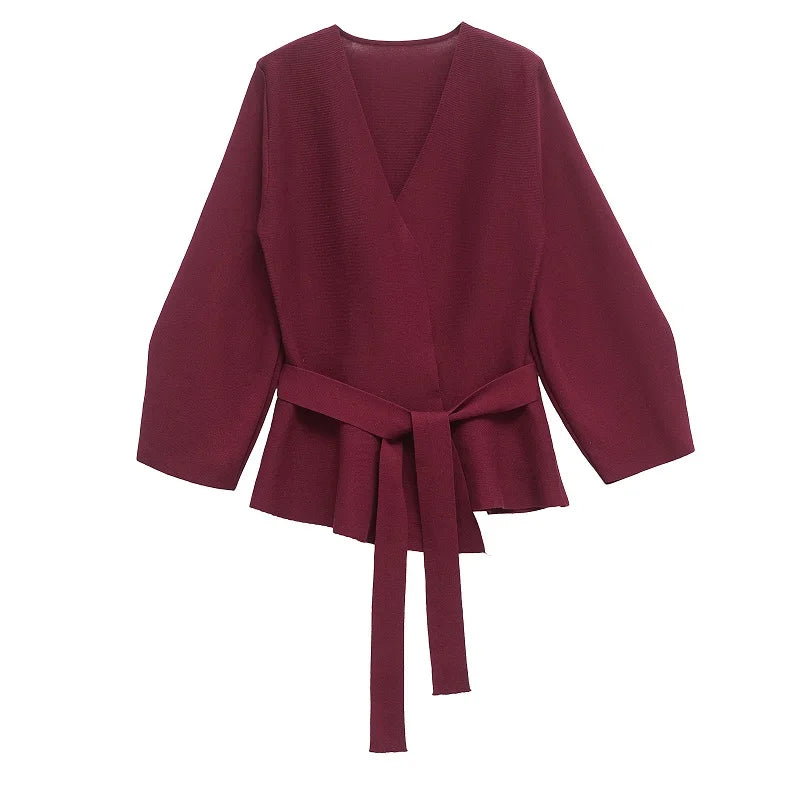 Burgundy wrap blouse with long sleeves and waist tie, elegant women's fashion top