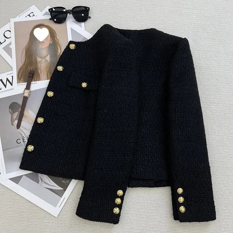 Elegant black tweed blazer with gold buttons, flat lay with magazines and sunglasses
