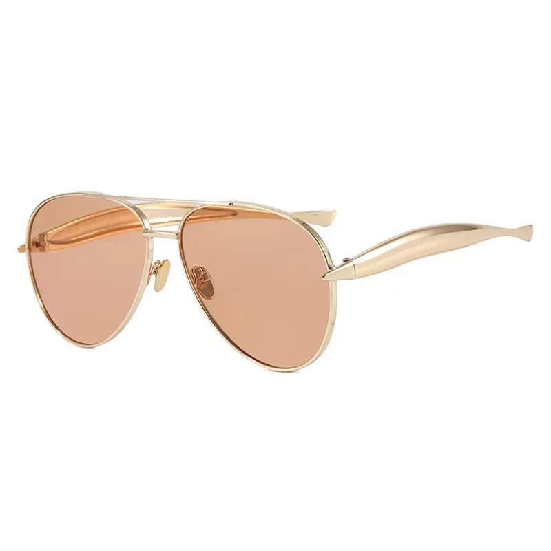 Gold aviator sunglasses with rose-tinted lenses and sleek, curved arms on white background.